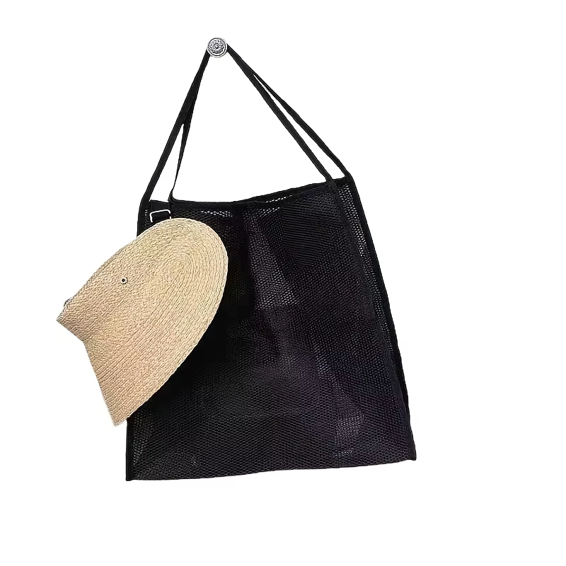 Un grand sac de plage surdimensionné, pliable et doté d'un revêtement de protection pour ranger les 
