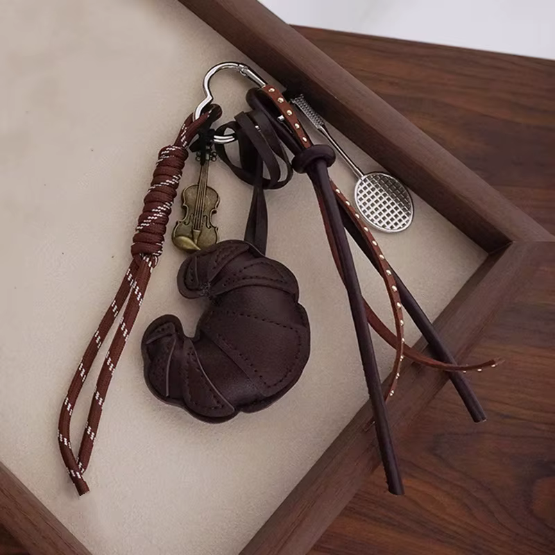 Porte-clés DIY en cuir tressé en forme de croissant, anti-perte, décoration de sac, pendentif de sac
