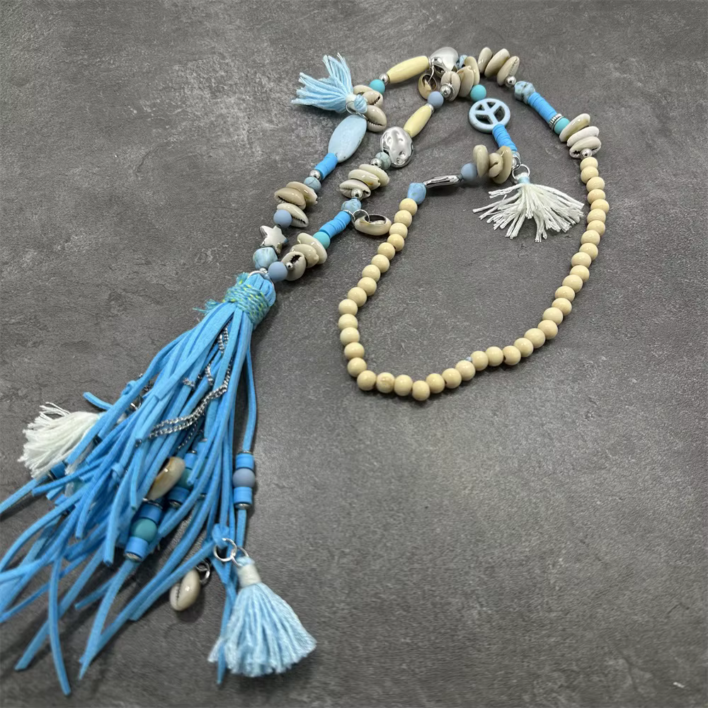 Femmes mode cuir gland longue perle pendentif collier pull chaîne accessoires bijoux à la mode