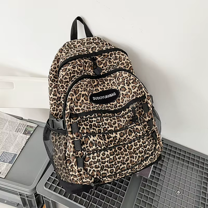 Sac à dos vintage à imprimé léopard, grande capacité, sac d'école avec poche latérale en maille, pou