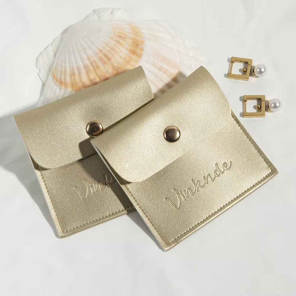 Pochette de luxe en cuir doré pour bijoux