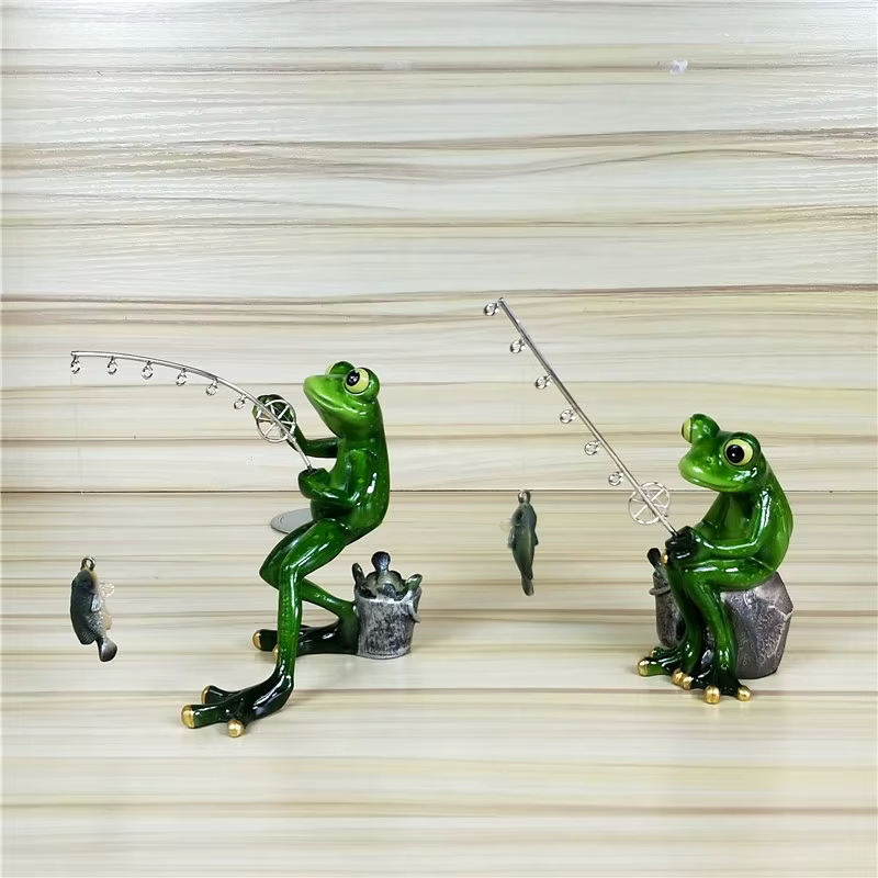 Grenouille de pêche l'inventaire en résine
