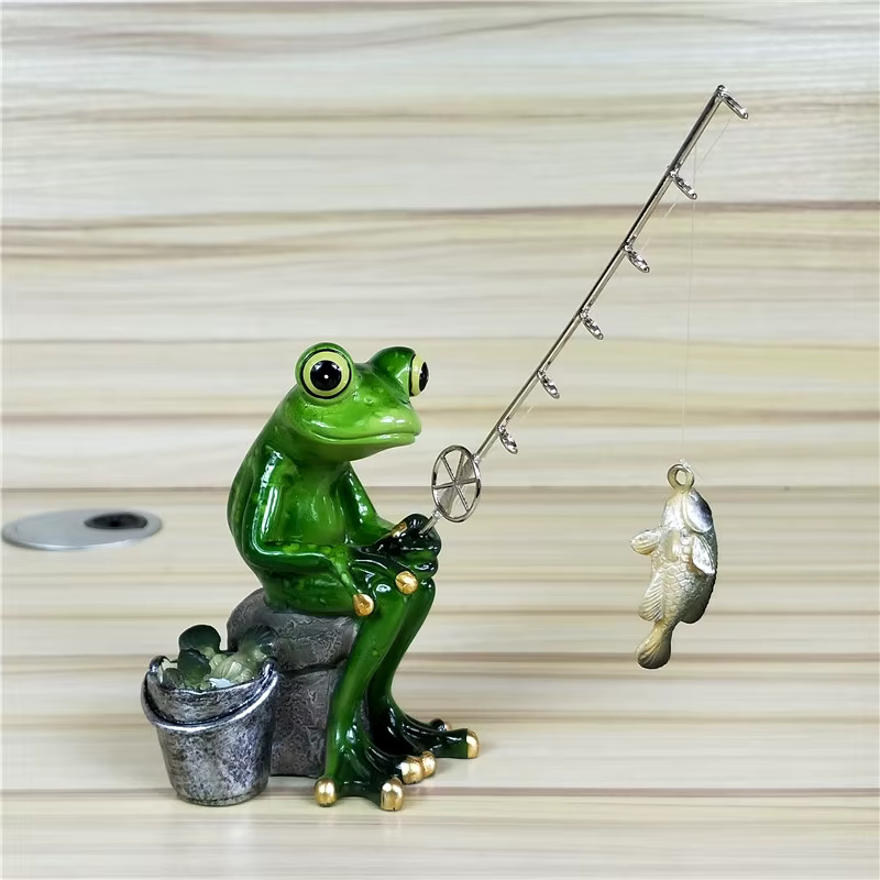Grenouille de pêche l'inventaire en résine
