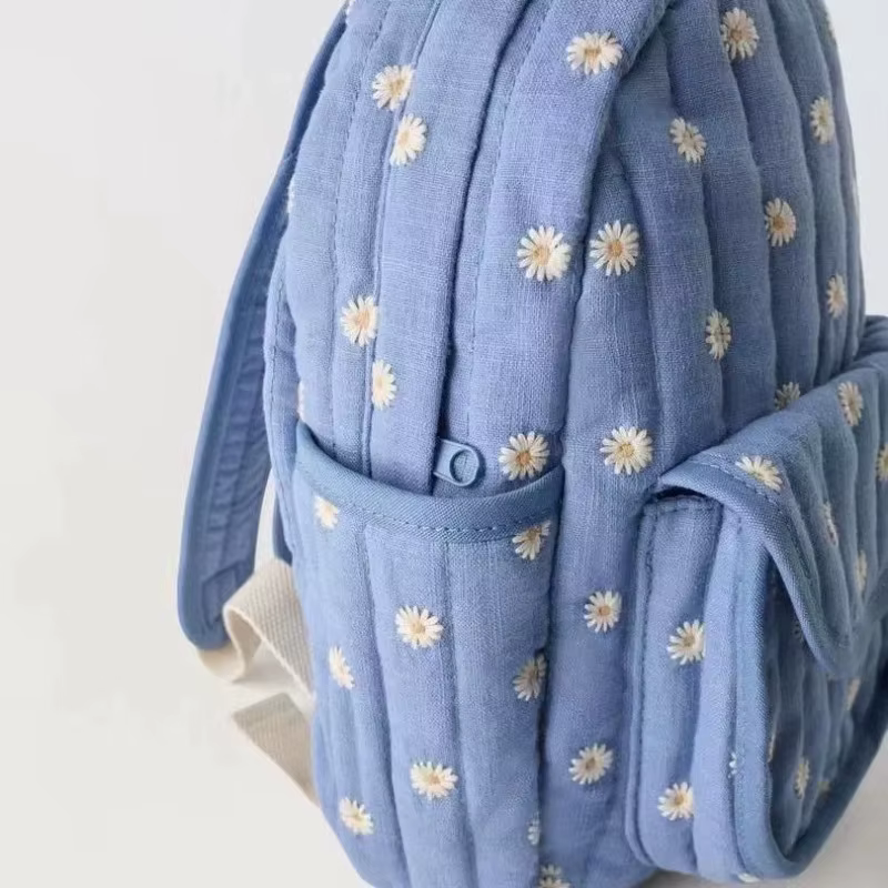 Sac à dos d'étudiant bleu marguerite de dessin animé, sac d'école brodé mignon, sac à dos décontracté unisexe tendance pour les voyages en plein air