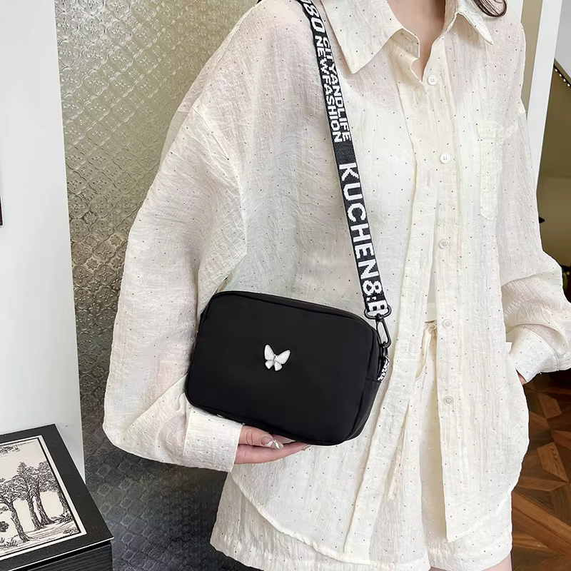 Sac à bandoulière noir et blanc