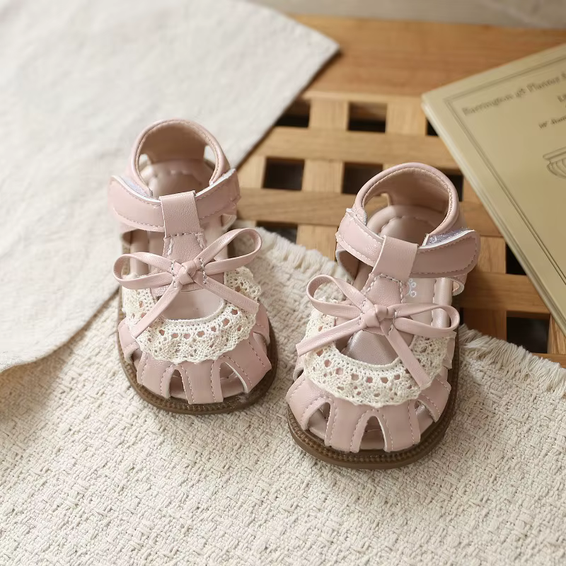 Chaussures de marche pour bébé, sandales de plage pour enfants, avec nœuds simples et mignons, semelle souple ajourée, antidérapantes, nouvelle collection été 2026, sandales de princesse pour tout-pet