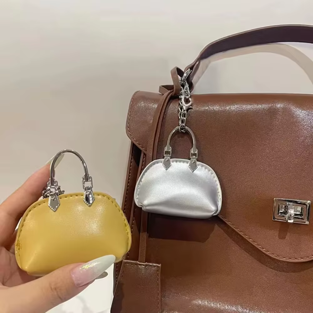 Nouveau Sac décoration sac pendentif petit cuir PU Mini sac à main couleur unie sac suspendu
