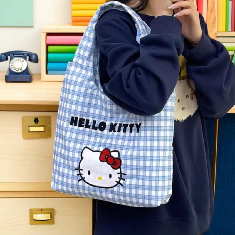 Sac fourre-tout en toile Hello Kitty pour femme, grande capacité, sac à bandoulière décontracté et mignon pour les trajets quotidiens, le travail, l'université, les voyages et les repas