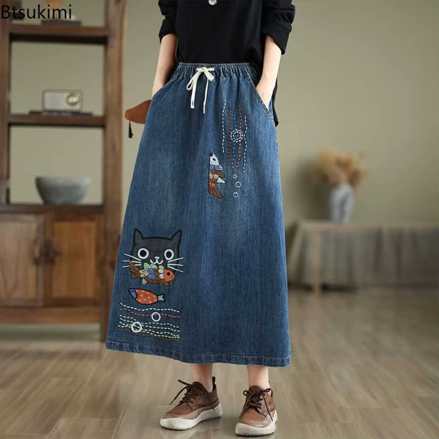 Jupes en jean pour femmes 2026, style rétro, broderie d'animaux de dessin animé, jupes mi-longues décontractées, printemps été, taille haute, mode, jupes midi amples