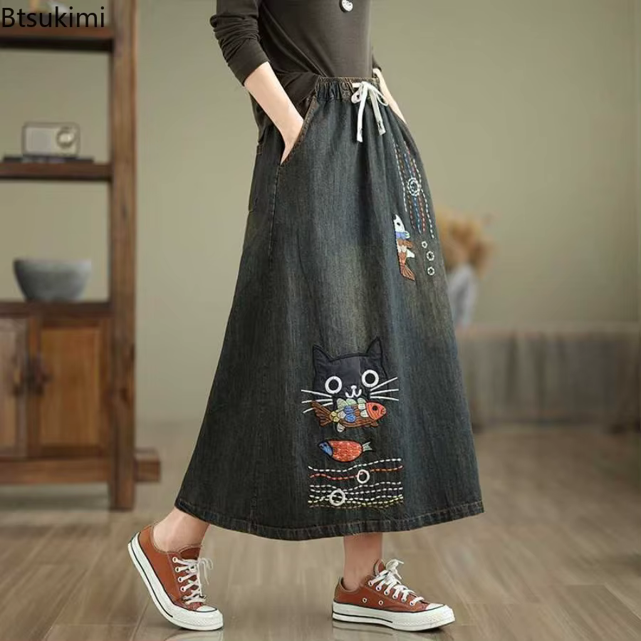 Jupes en jean pour femmes 2026, style rétro, broderie d'animaux de dessin animé, jupes mi-longues décontractées, printemps été, taille haute, mode, jupes midi amples