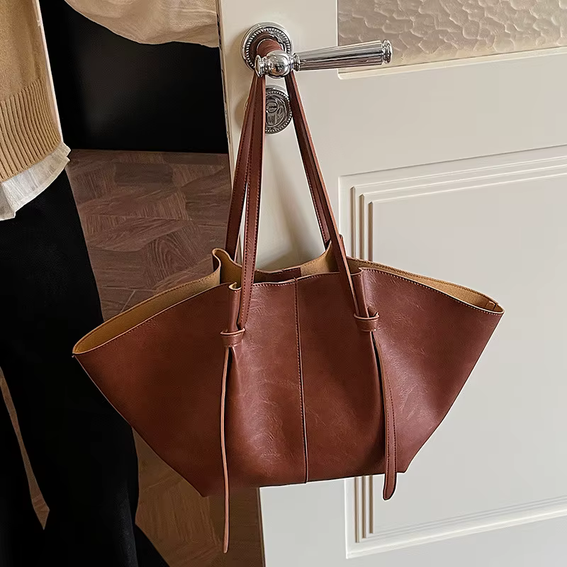 Sac fourre-tout rétro grande capacité, nouveau style 2026, sac de banlieue à bandoulière unique, sac de shopping populaire transfrontalier