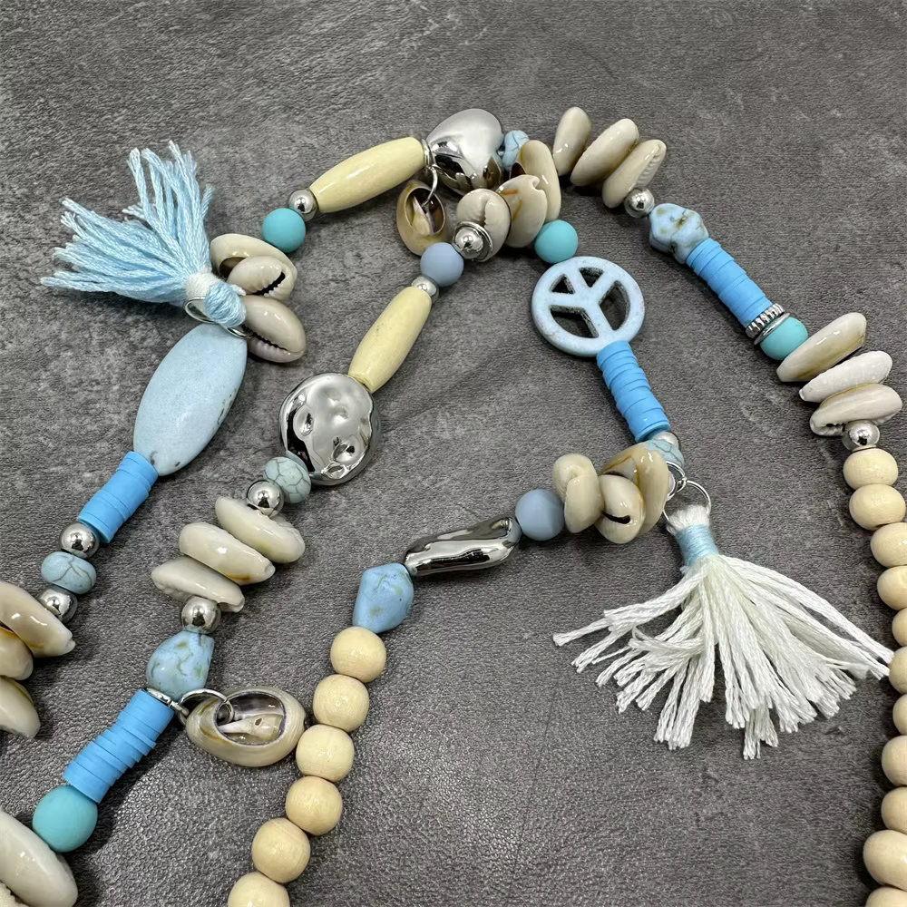 Femmes mode cuir gland longue perle pendentif collier pull chaîne accessoires bijoux à la mode