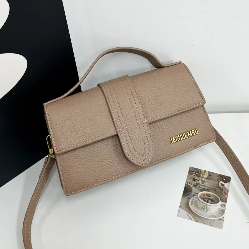 Sac à langer de créateur, sac fourre-tout en cuir de marque de luxe célèbre pour femmes, mode parisienne, couleur unie, logo à lettres