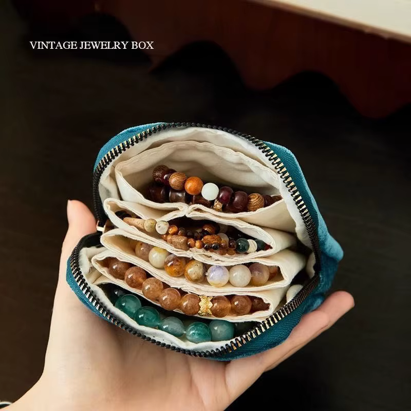 Sac de rangement pour bijoux exquis avec pendentif en forme de pompon