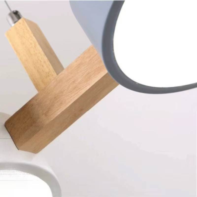 Lampe suspendue LED à trois têtes en forme de macaron