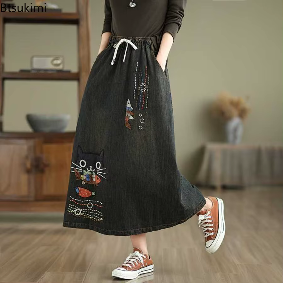 Jupes en jean pour femmes 2026, style rétro, broderie d'animaux de dessin animé, jupes mi-longues décontractées, printemps été, taille haute, mode, jupes midi amples