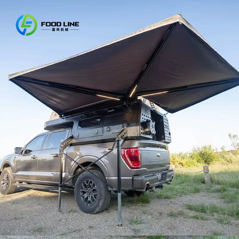 Camper pick-up tout-terrain personnalisé avec système de tiroirs extractibles et auvent pour le camping en zone isolée