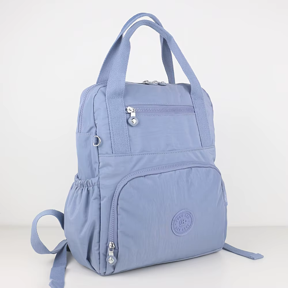 Sac à dos femme, sac à dos de voyage, cartable d'école, grande capacité et poches multiples, matière nylon.
