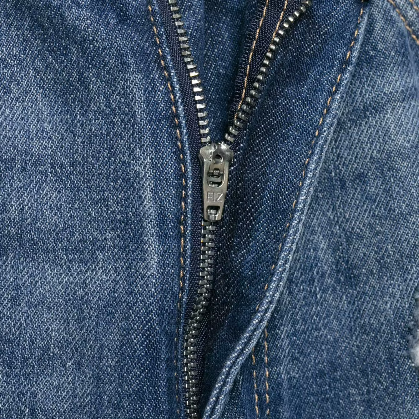 Jean rétro style américain taille haute coupe large à cinq poches en denim déchiré coton Printemps 2026 Tendance Streetwear Confortable