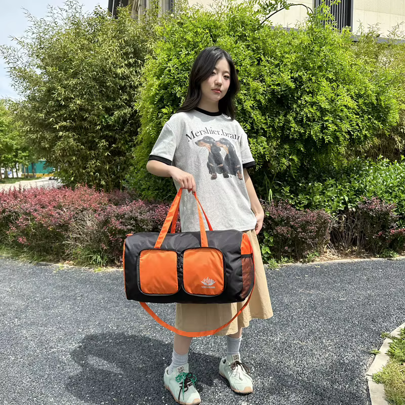 Nouveau sac pliant de voyage pour hommes et femmes de grande capacité