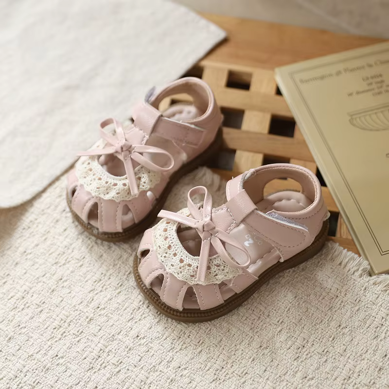 Chaussures de marche pour bébé, sandales de plage pour enfants, avec nœuds simples et mignons, semelle souple ajourée, antidérapantes, nouvelle collection été 2026, sandales de princesse pour tout-pet