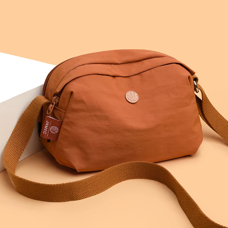 2025 Nouveau Jialongshi Sac à bandoulière simple pour femme à la mode et polyvalent, sac à bandoulière décontracté et simple, tissu en nylon imperméable