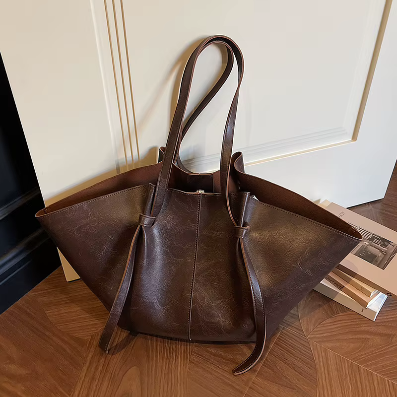 Sac fourre-tout rétro grande capacité, nouveau style 2026, sac de banlieue à bandoulière unique, sac de shopping populaire transfrontalier