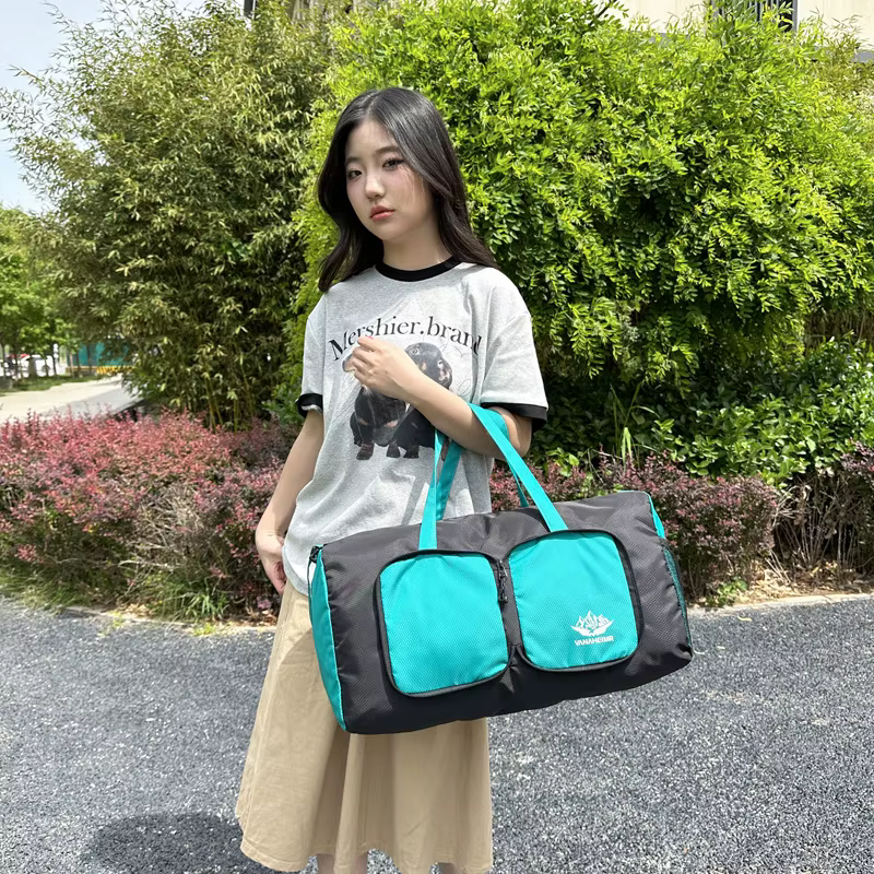 Nouveau sac pliant de voyage pour hommes et femmes de grande capacité