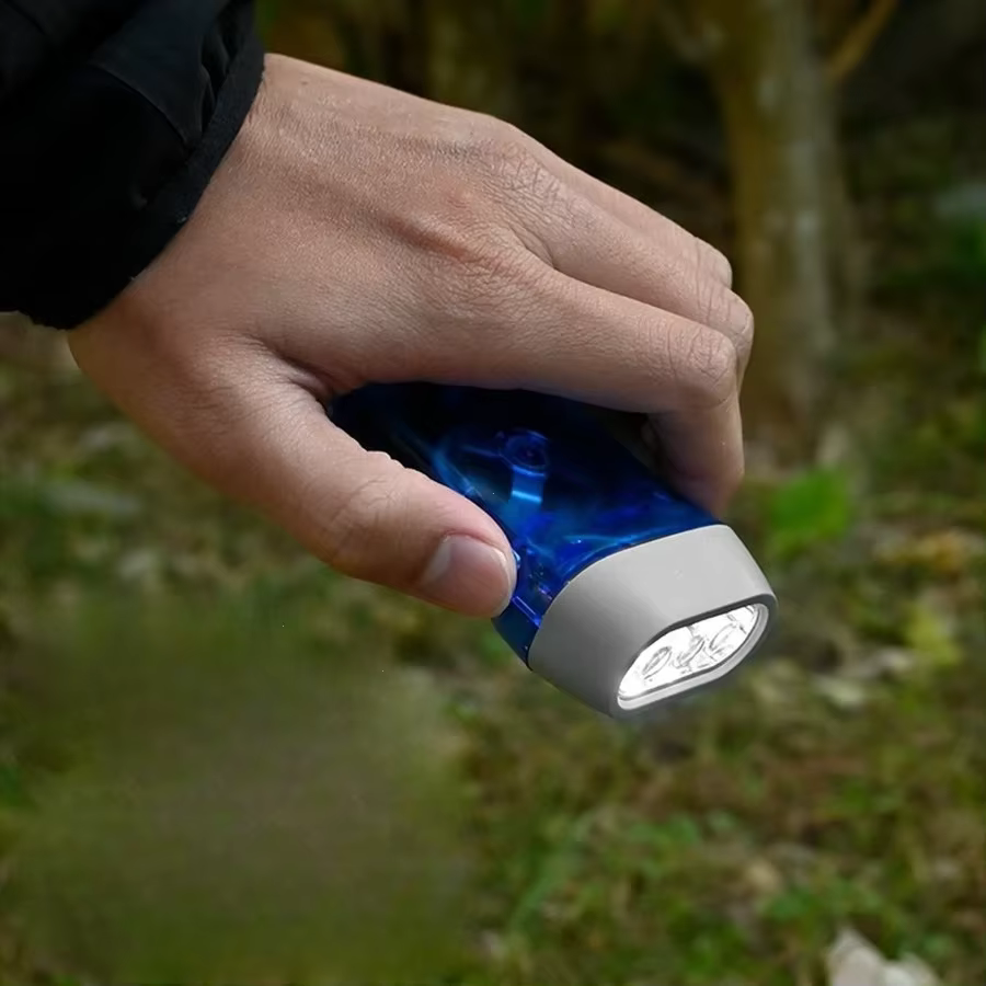 Lampe de poche à manivelle Dynamo à pression manuelle pour l'extérieur