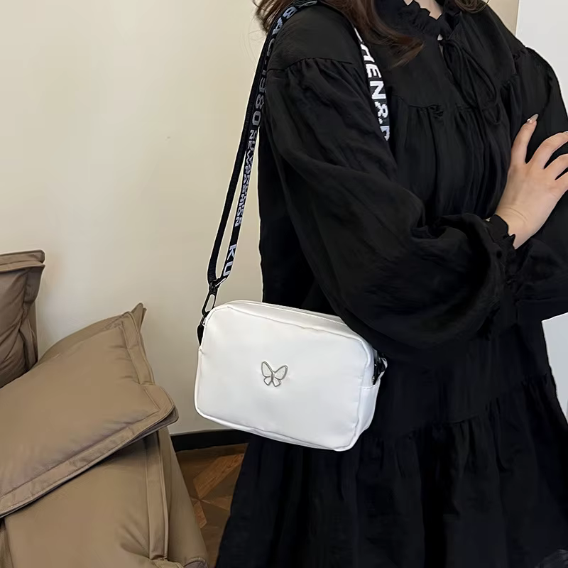 Sac à bandoulière noir et blanc