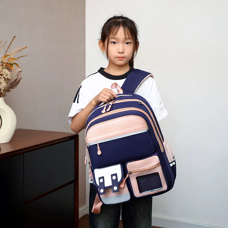 Nouveau Sac à Dos Scolaire Maternelle Dessin Animé Grande Capacité Double Bretelles Protection de la Colonne Vertébrale Réduction de la Charge Nylon Imperméable Unisexe