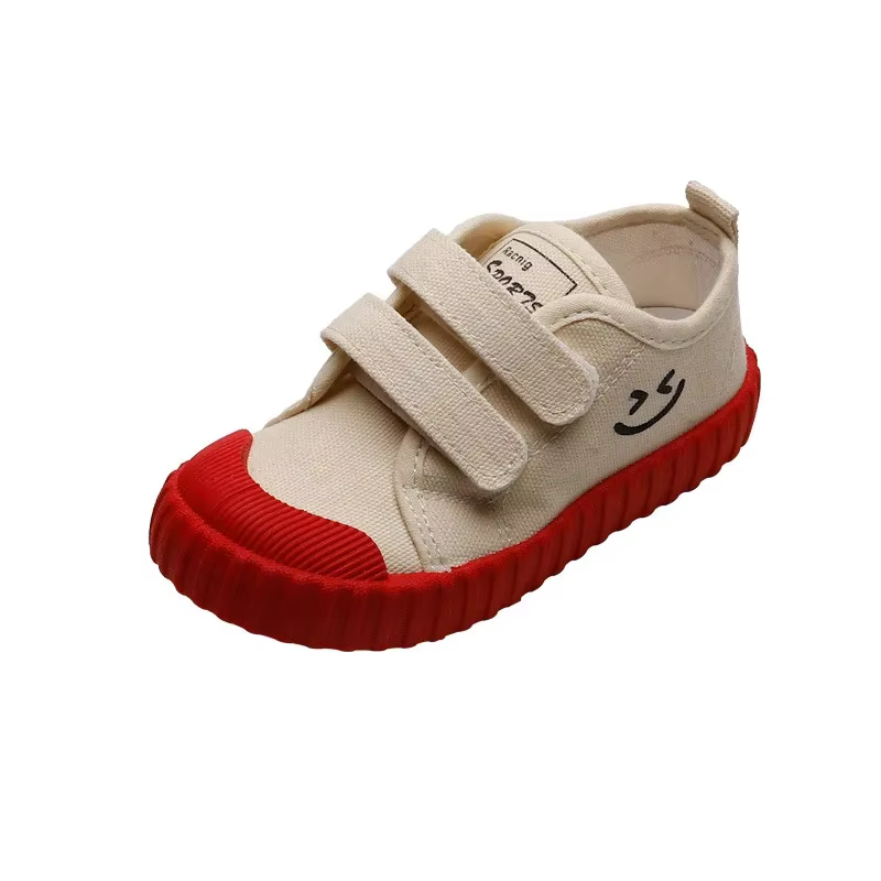 Chaussures en toile pour enfants Version coréenne visage souriant chaussures décontractées printemps garçons filles chaussures académie maternelle confortable quotidien