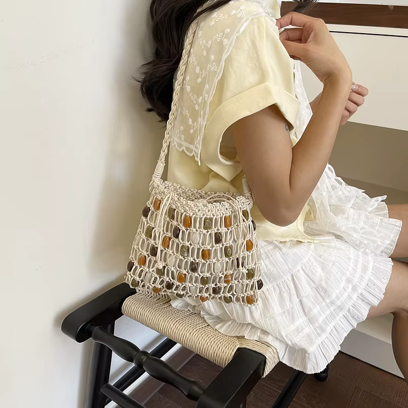 Sac fourre-tout d'été 2026 en crochet perlé style bohème, sac tissé ajouré fait main, sac de plage bohème grande capacité en paille pour voyage