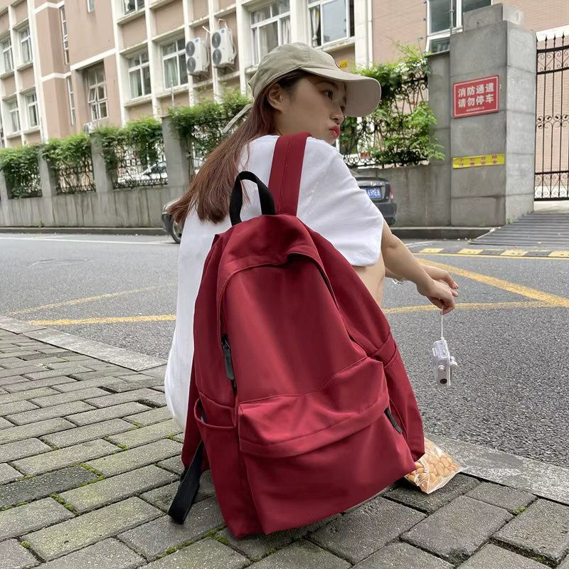 Sac à dos polyvalent noir gris blanc rouge