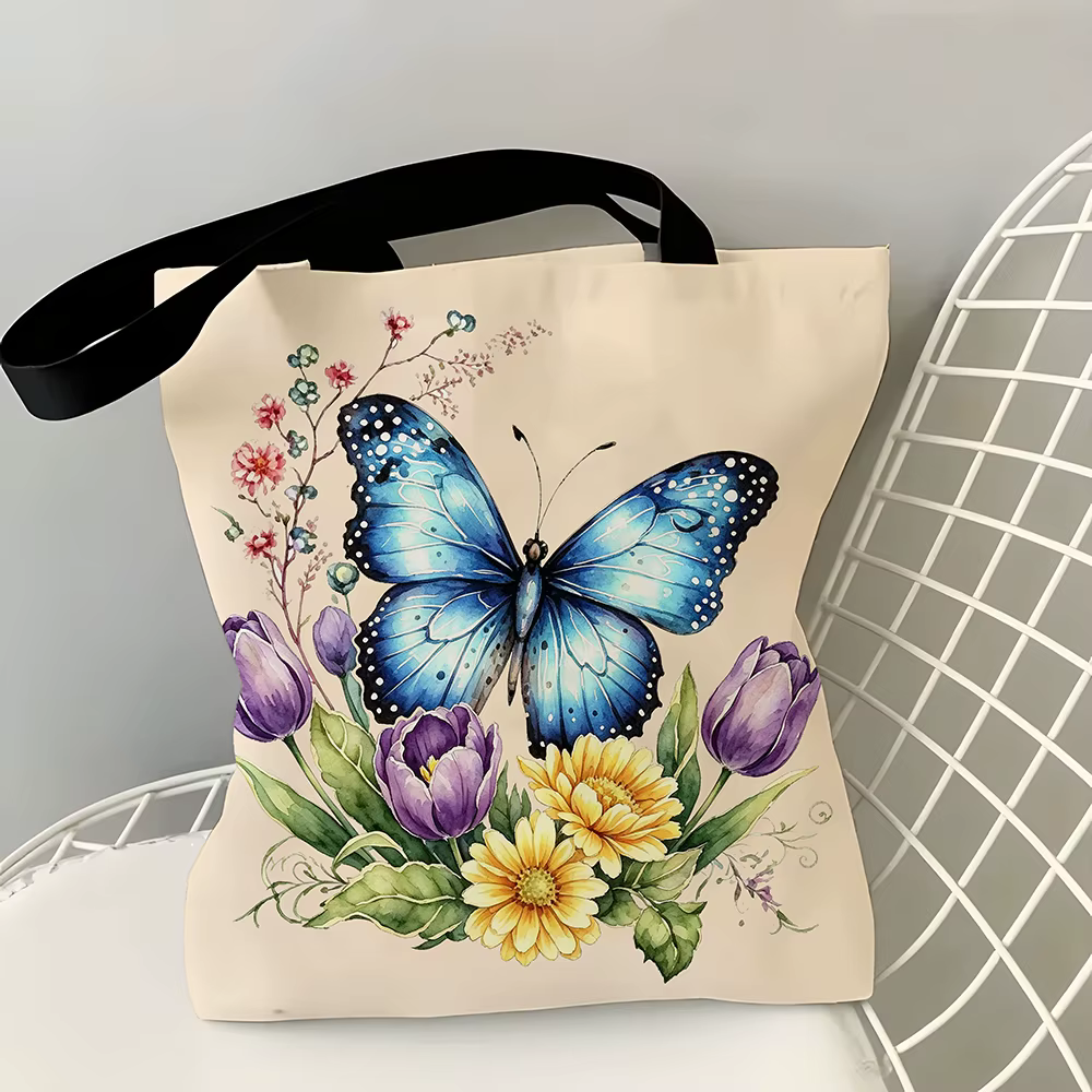 Sac fourre-tout en toile bleu aquarelle avec motif floral de papillons – Imprimé botanique vibrant avec des tulipes, des marguerites et des brindilles sauvages, écologique
